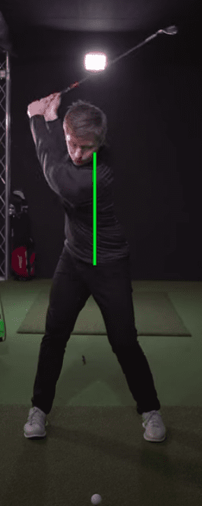 Spine angle at the top of the backswing with an iron 