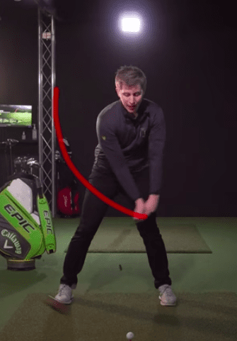Hands moving steeply down through impact, follow our golf driving tips to hit longer and straighter tee shots